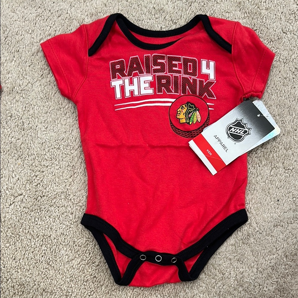 NHL Red and Black Bodysuit Raised in the Rink